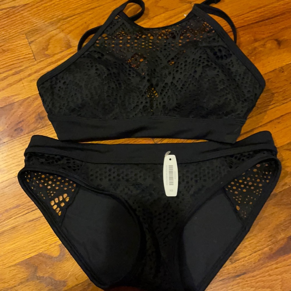 Black two piece swim suit, top size s, bottom xs